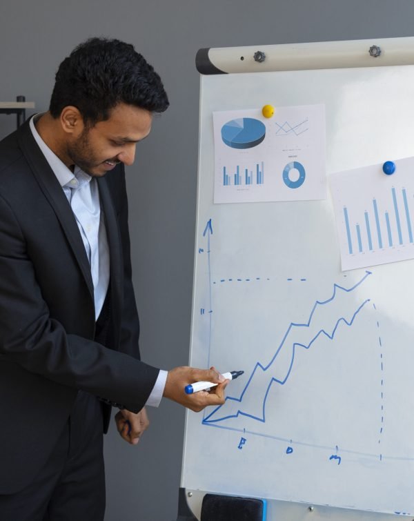 business-person-looking-finance-graphs (1)
