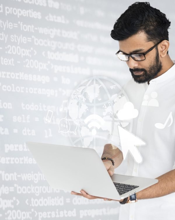 Indian software engineer working on his laptop